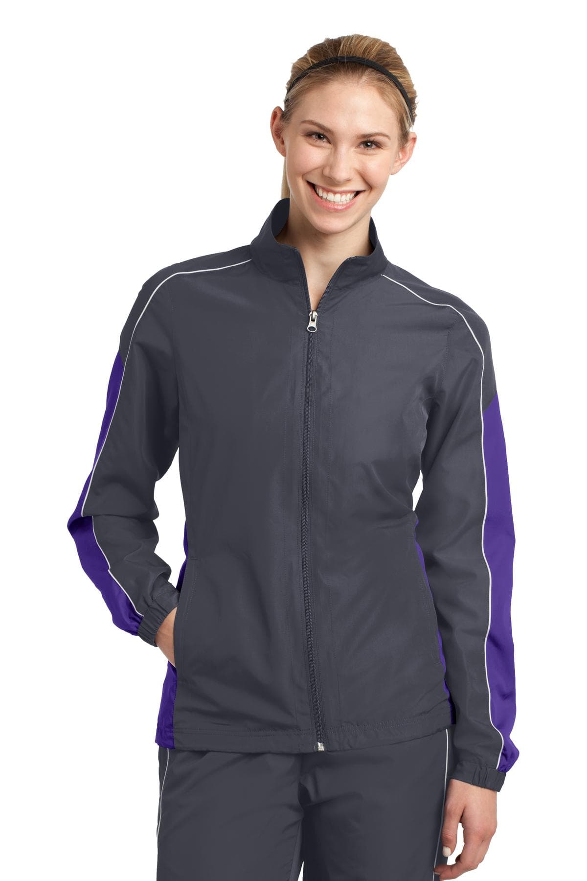 DISCONTINUED Sport-Tek Ladies Piped Colorblock Wind Jacket. LST61